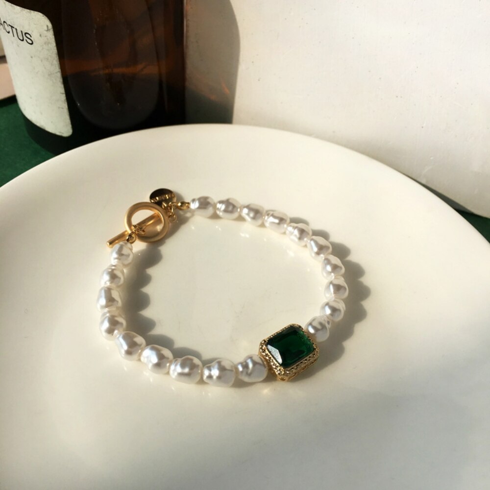 Dámský perlový náramek Green Eye s krystalem – Golden Diva
