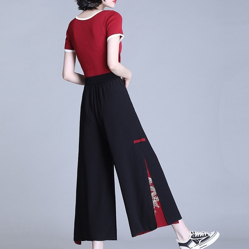 Dámské černé designové kalhoty Japan – Golden Diva