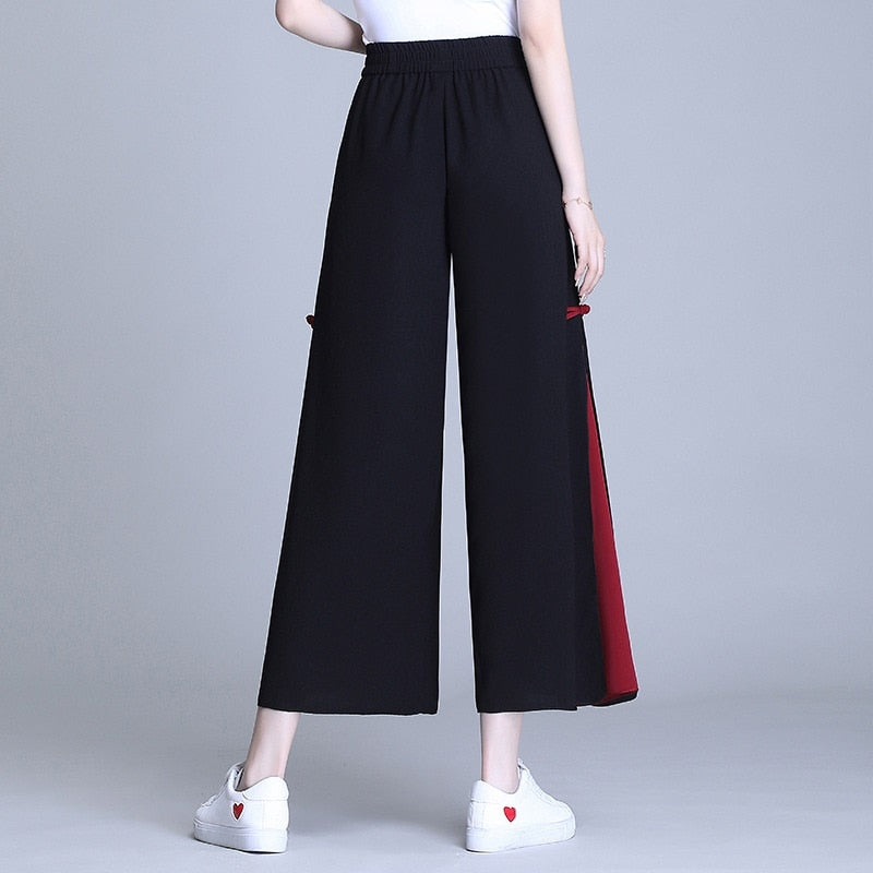 Dámské černé designové kalhoty Japan – Golden Diva