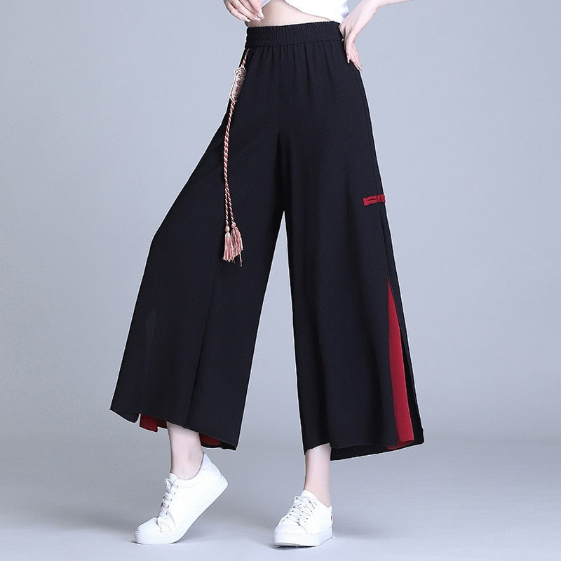 Dámské černé designové kalhoty Japan – Golden Diva