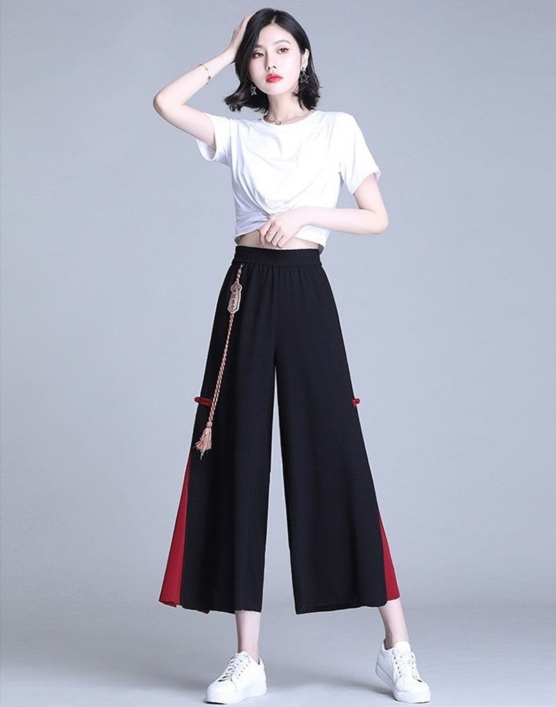 Dámské černé designové kalhoty Japan – Golden Diva